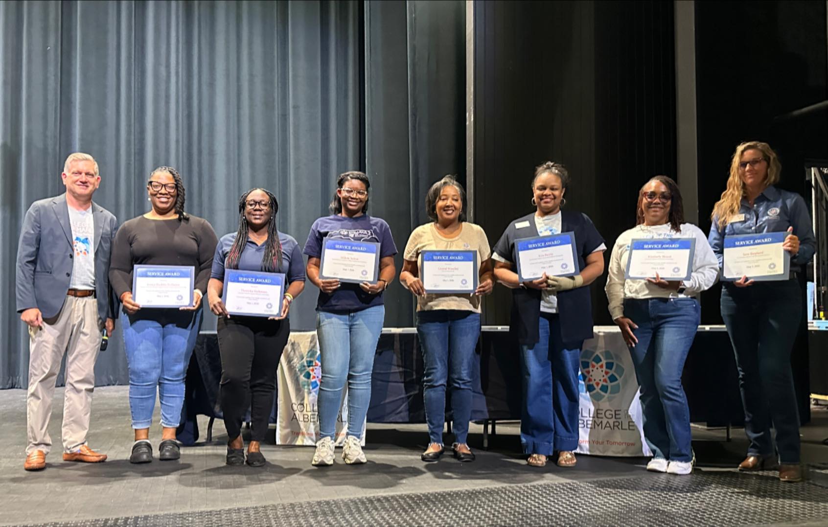 Recipients of Five-Year Service Awards are pictured with Dr. Jack Bagwell, COA President (from left): Jessica Buckley-Williams, Thomyka Holloman, JaQuay Sutton, Crystal Woodley, Kris Burris, Kimberly Blount and Sara Shepherd. Not pictured: Joshua Alcocer, Clifton Beaman, Jr., Scott Breon, Elizabeth England, Carla Godwin and Maurice Jordan. 