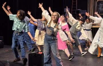 Welcome to the Zuckerman Barn! Charlotte Sadler, Elise Wilson, Aven Hall, Abigail Birchfield, other cast members welcome Wilbur to the barn in a rehearsal of COAST's fall musical, Charlotte's Web.