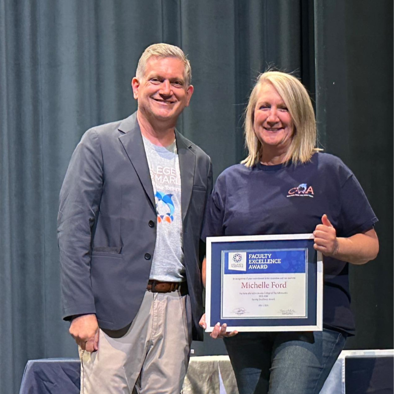 Faculty Excellence Award recipient Michelle Ford is pictured with Dr. Jack Bagwell, COA President.
