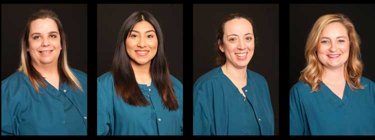 Medical Assisting graduates posing in scrubs