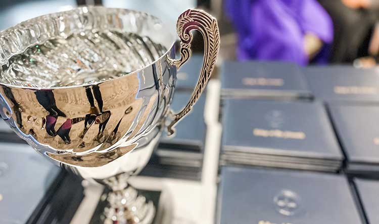 COA cup and diplomas